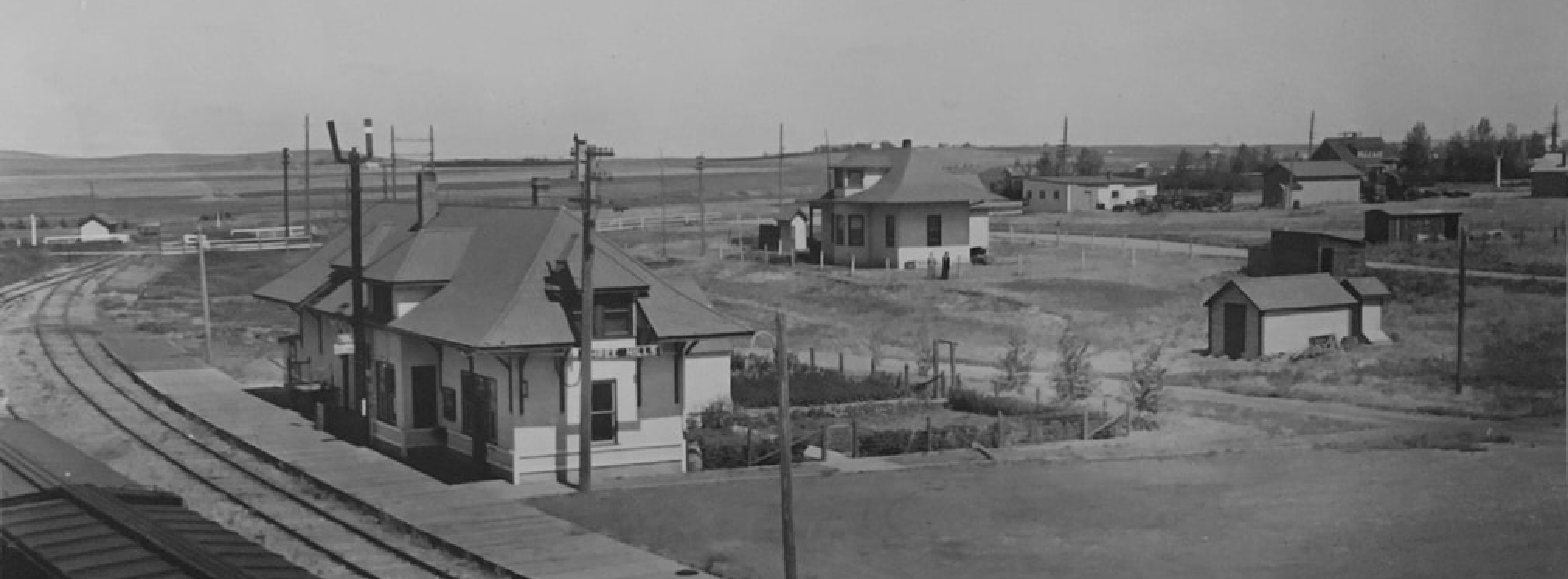 Early days in central Alberta viewing rail lines and station houses